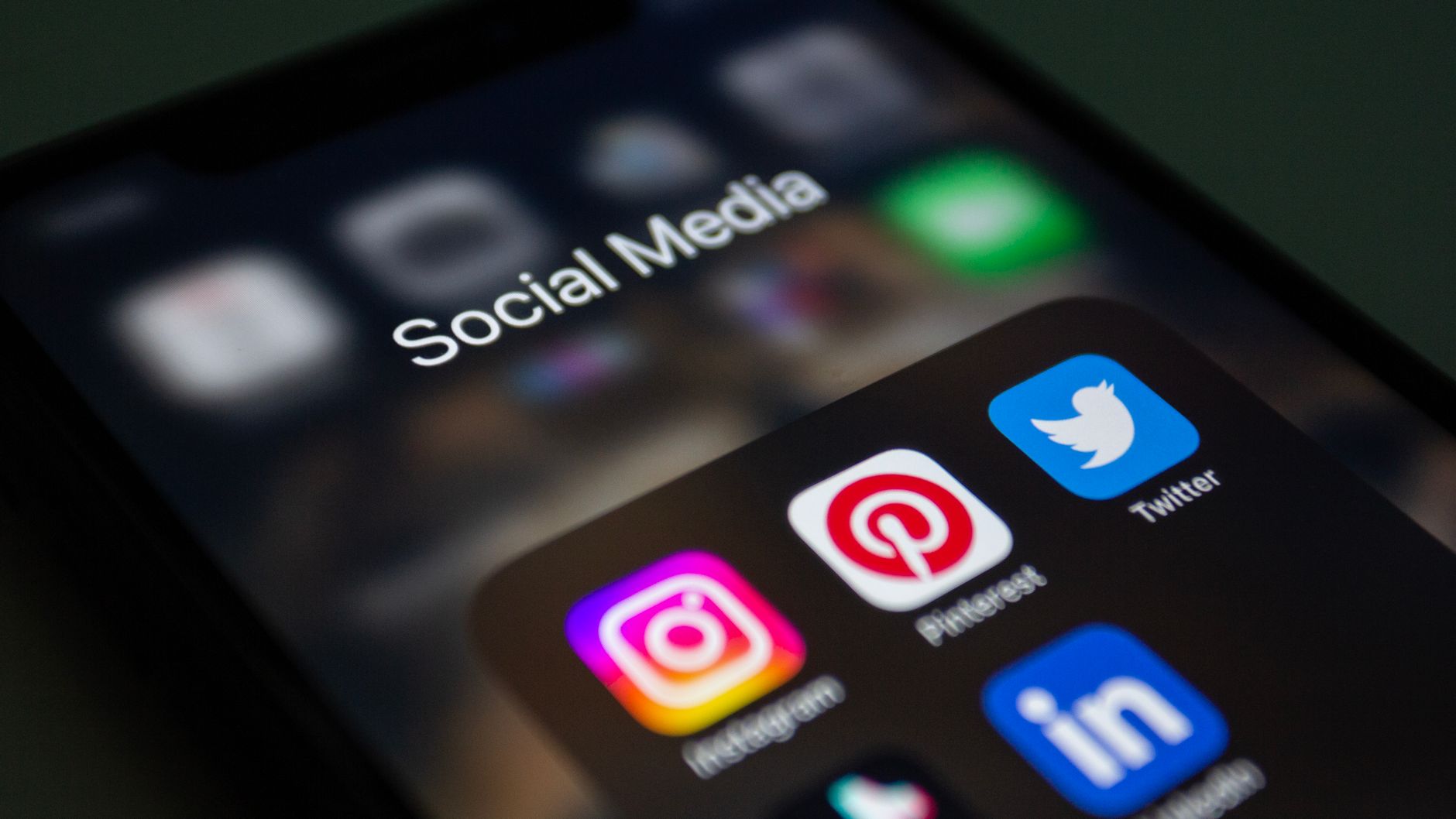 A smartphone screen displaying popular social media applications like Instagram and Twitter. — Grow Your Instagram Followers