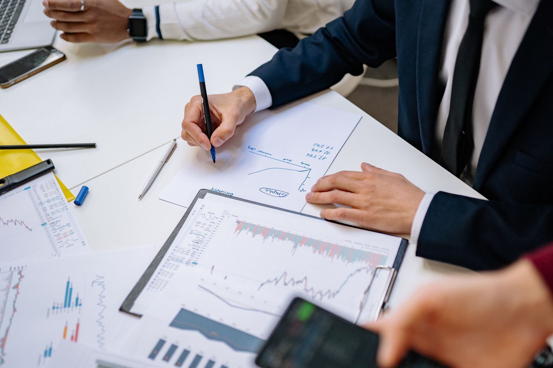 Professionals analyzing financial charts in a corporate setting. — Unlocking the Power of Korean Search Engine Optimization (